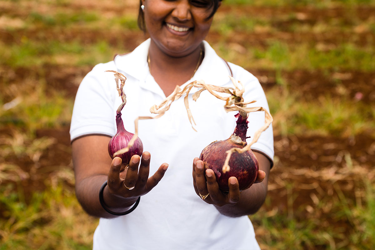 Farmer holding produce